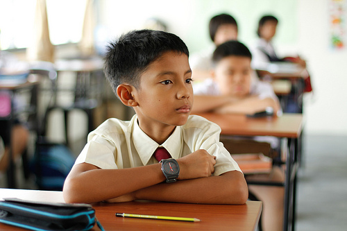 Students study the Malay language as one of ths subjects of Thai Hong Primary School in Johor Bahru on 26 July 2011. Children in Malaysia begin promary schooling at around 7 years old.